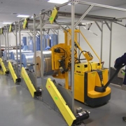 Reems of medical drape material being staged in the computerized cutting area